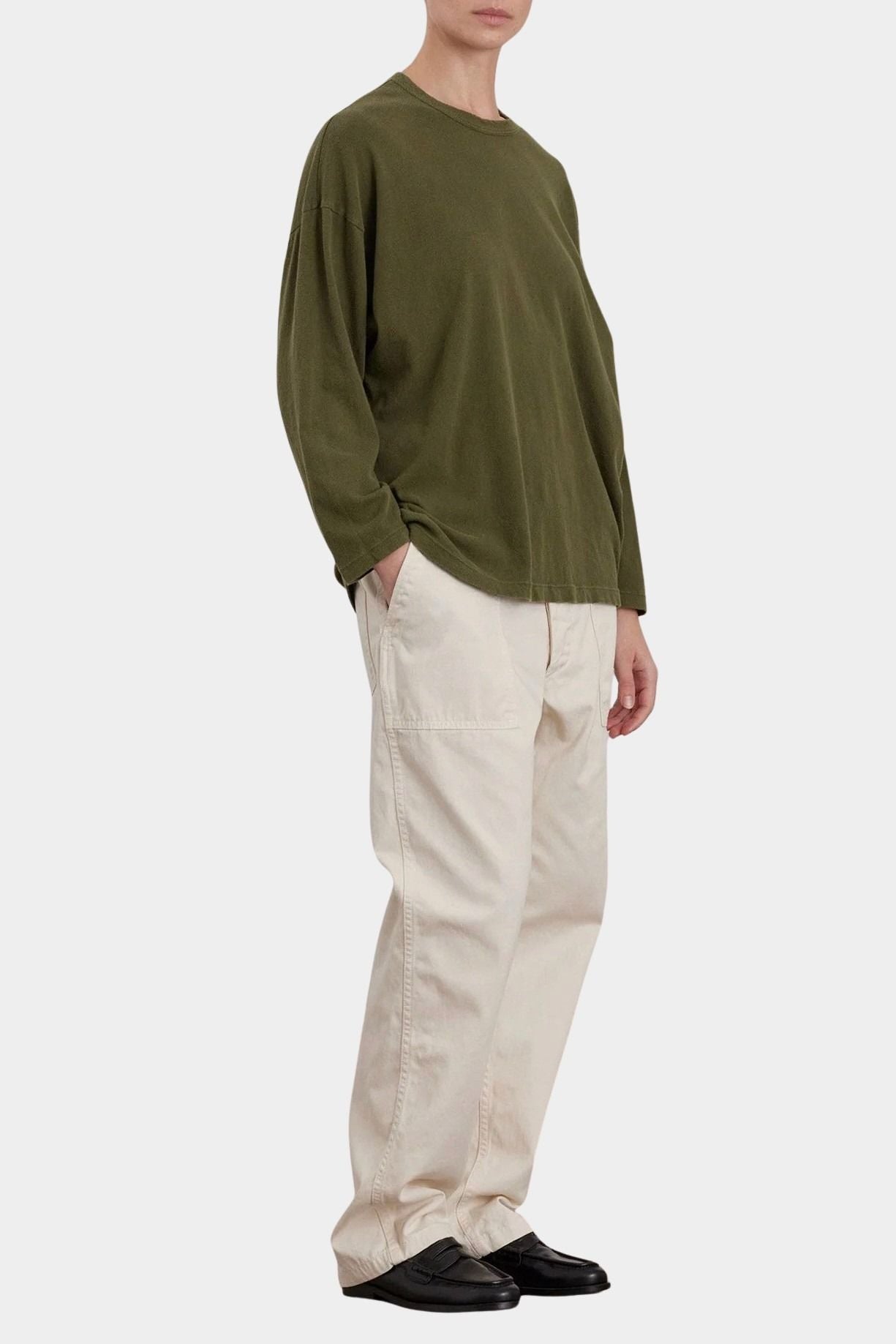 Black Crane Loose Fit Long Sleeve Army front three quarter view showing relaxed fit and dropped shoulders
