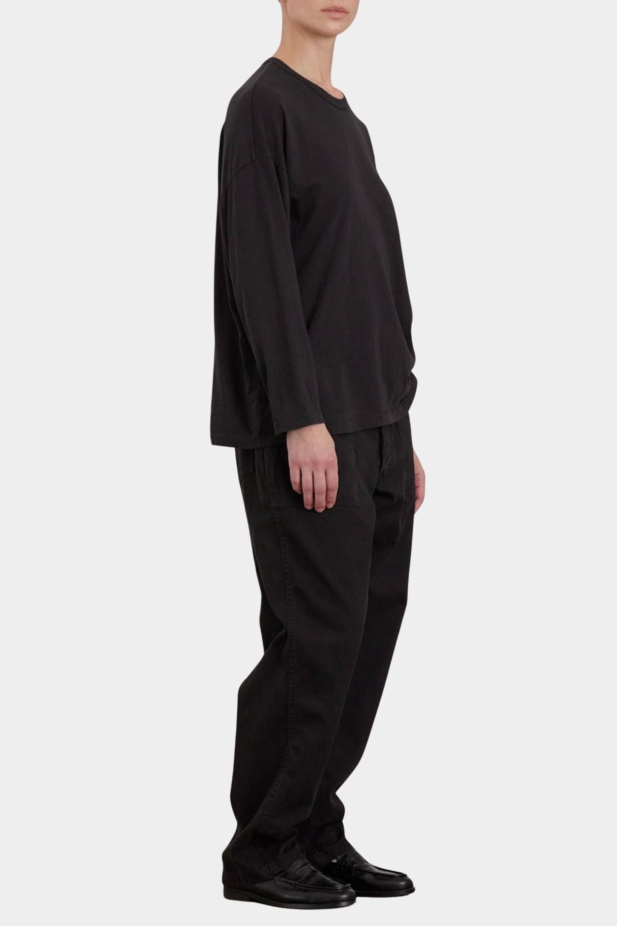 Black Crane Loose Fit Long Sleeve Black side view showing relaxed silhouette and dropped shoulders