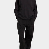 Black Crane Loose Fit Long Sleeve Black full length styling view with relaxed black pants