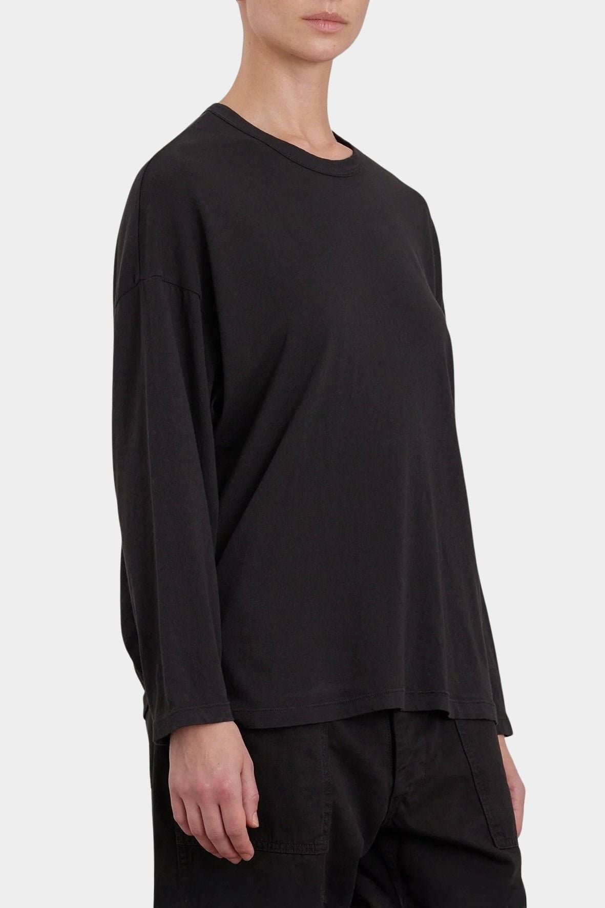 Black Crane Loose Fit Long Sleeve Black three quarter view showing relaxed drape and long sleeves