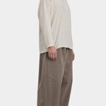 Black Crane Loose Fit Long Sleeve White side view showing relaxed silhouette and dropped shoulder