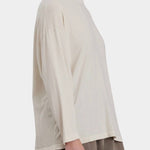 Black Crane Loose Fit Long Sleeve White side view showing roomy shape and long sleeves