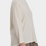Black Crane Loose Fit Long Sleeve White side view showing roomy shape and long sleeves