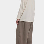 Black Crane Loose Fit Long Sleeve White back three quarter view showing oversized drape