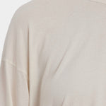 Black Crane Loose Fit Long Sleeve White close up showing soft jersey texture and crew neckline
