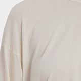 Black Crane Loose Fit Long Sleeve White close up showing soft jersey texture and crew neckline