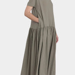 black crane new easy dress cement cotton gauze short sleeve boat neck side view with pockets