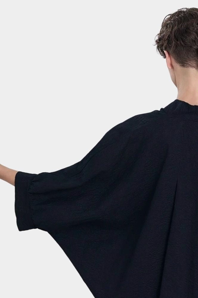 Black Crane spoon jacket midnight sleeve detail wide cuff draped silhouette