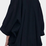 Black Crane spoon jacket midnight angled back view balloon sleeve detail volume