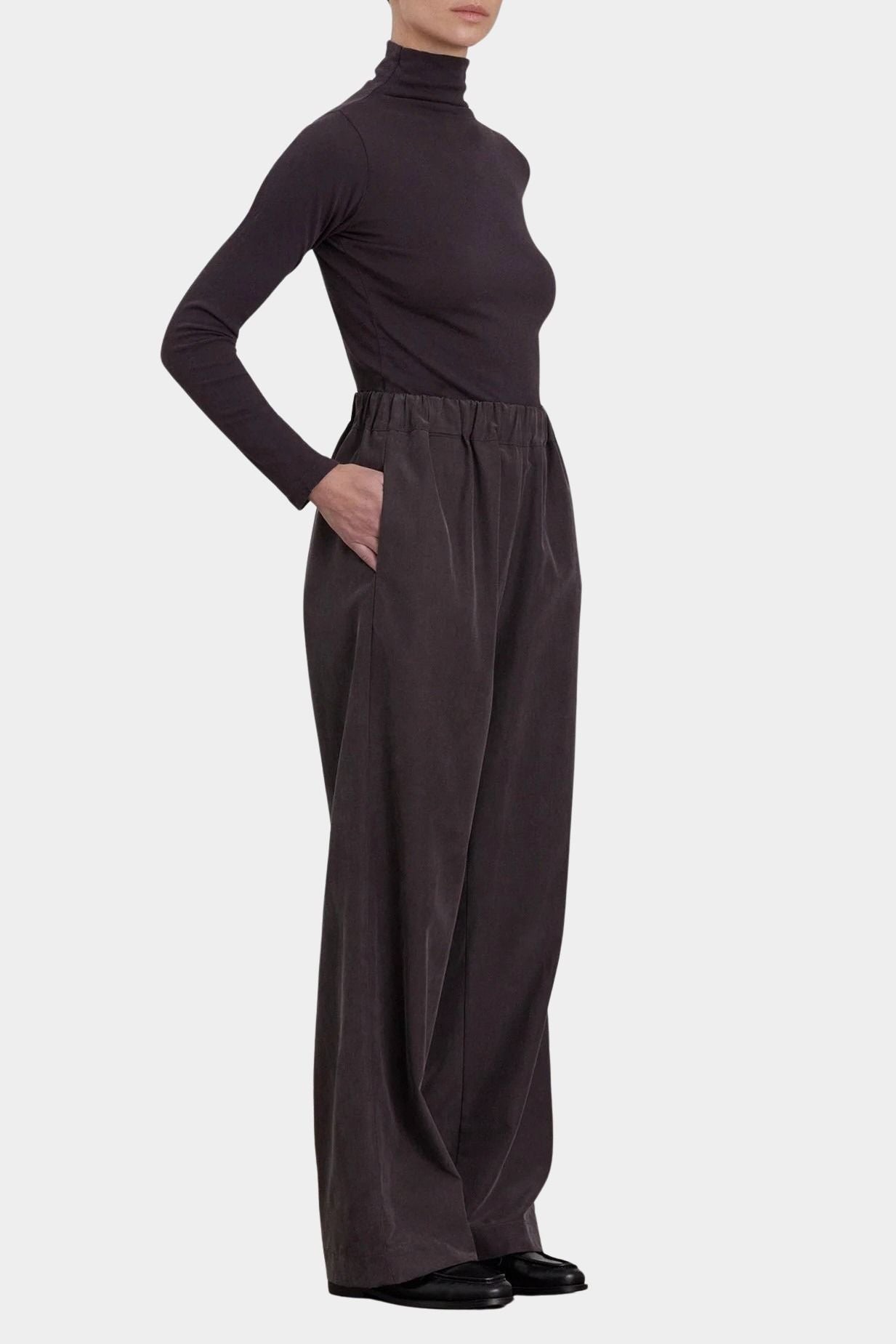 Black Crane Straight Pants Dark Plum three quarter view with side pocket and straight leg silhouette