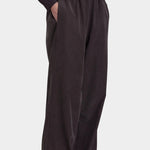 Black Crane Straight Pants Dark Plum side view showing elastic waist, side pocket and fluid straight leg