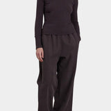 Black Crane Straight Pants Dark Plum full length front view styled with fitted turtleneck