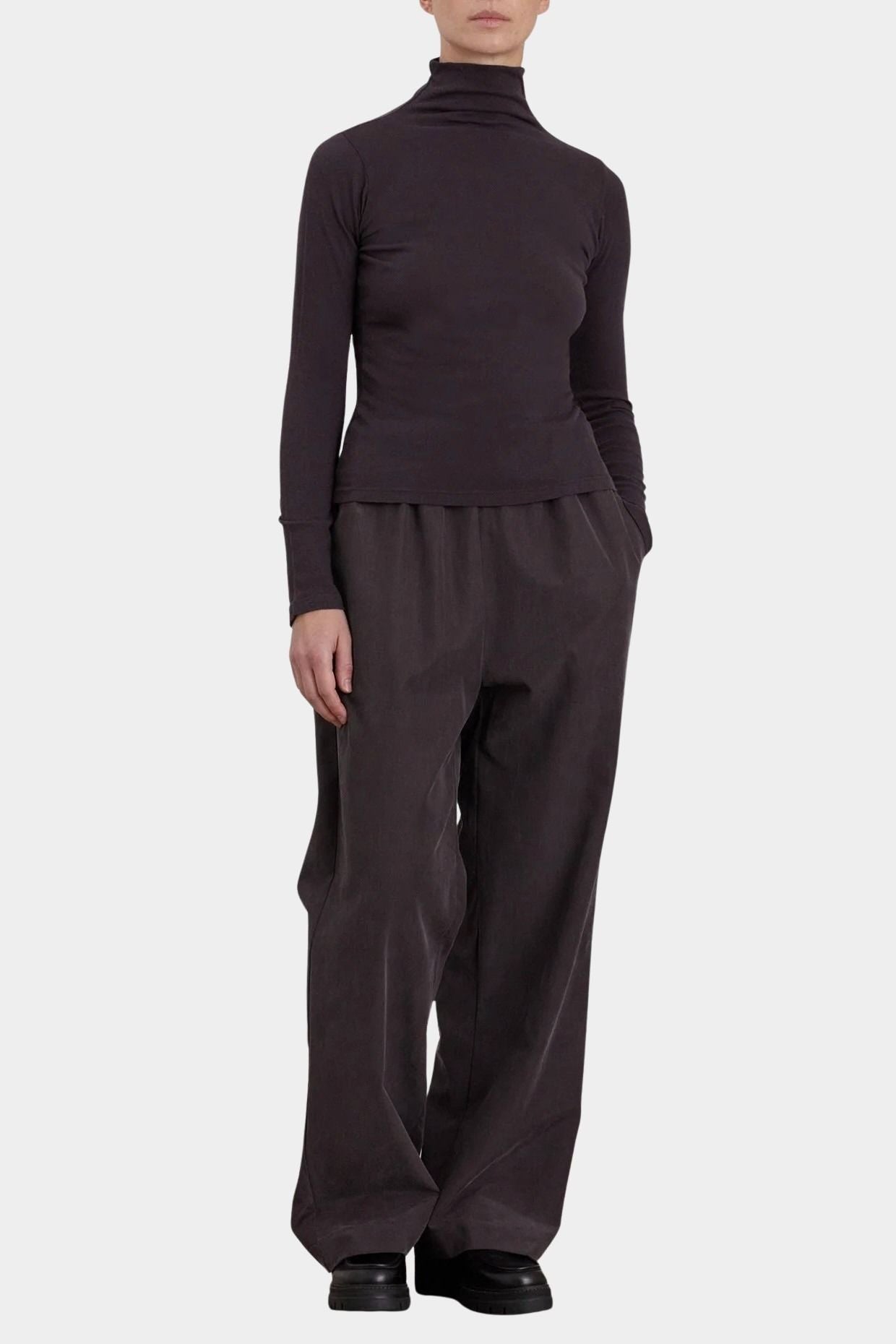 Black Crane Straight Pants Dark Plum full length front view styled with fitted turtleneck