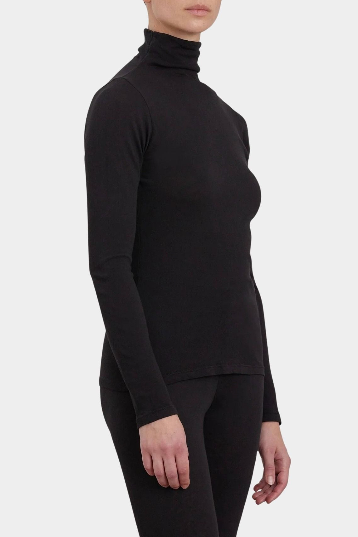 Black Crane Turtle Neck Long Sleeve Black three quarter view showing soft turtleneck and close fit