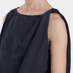 Black Crane twisted tank top faded black side profile showing loose fit and fluid shape