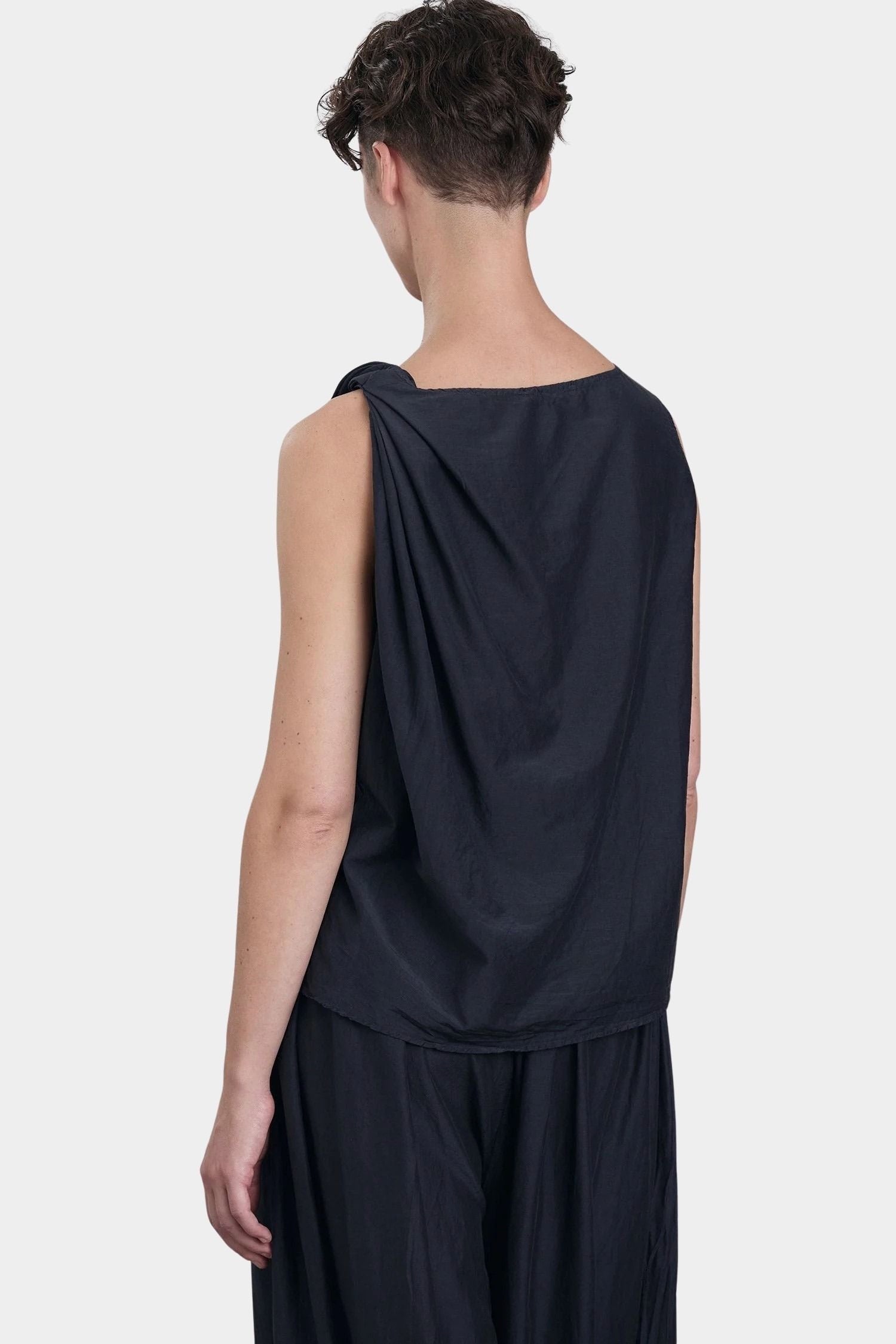 Black Crane faded black sleeveless cotton tank top back view with soft drape