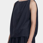 Black Crane faded black twisted tank top side view with asymmetric drape and relaxed silhouette