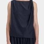 Black Crane twisted tank top in faded black lightweight cotton with draped shoulder detail front view