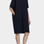 Black Crane v neck dress midnight full body relaxed silhouette soft drape knee length