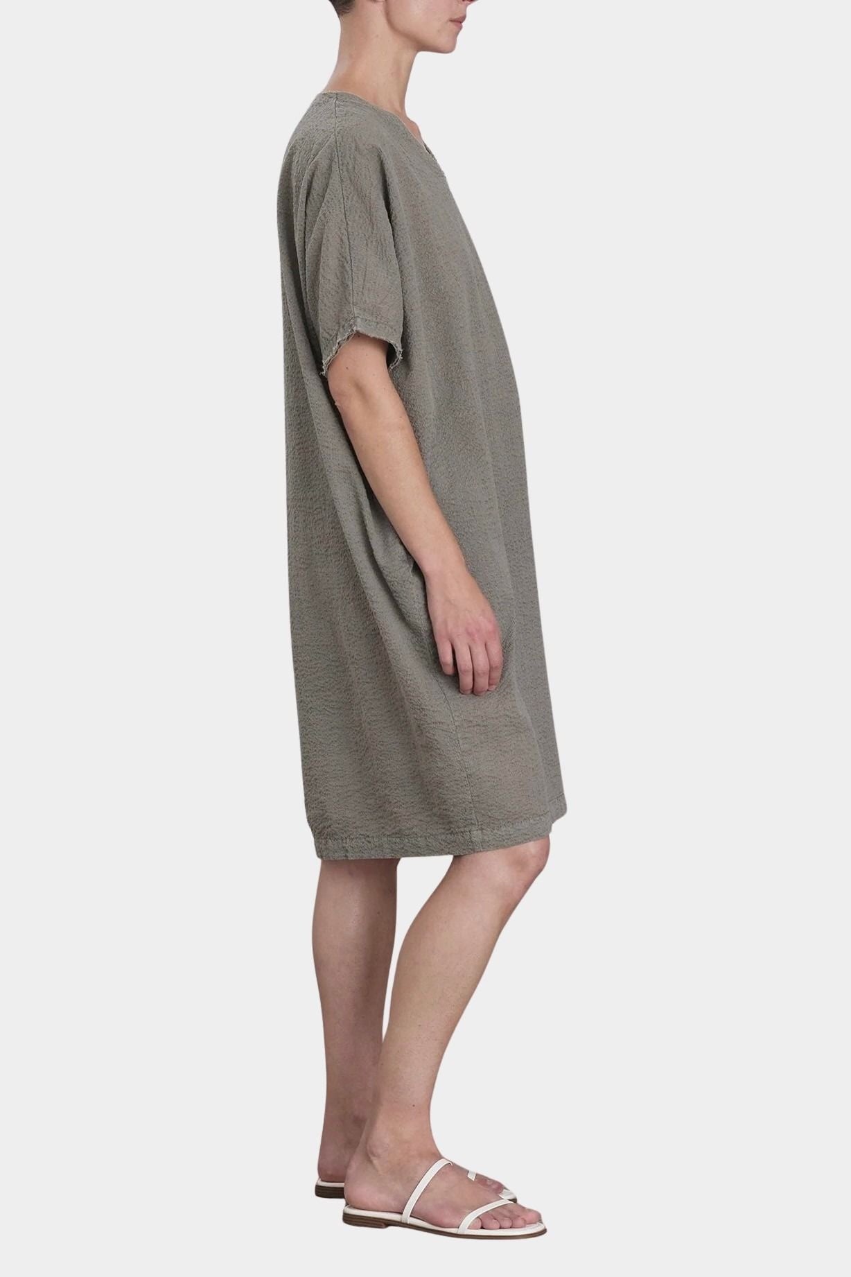 Black Crane v neck dress p grey angled side view loose fit minimal shape