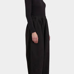 Black Crane Wide Pants Black side view showing full cropped leg and relaxed drape