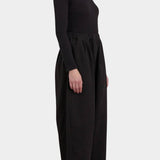 Black Crane Wide Pants Black side view showing full cropped leg and relaxed drape