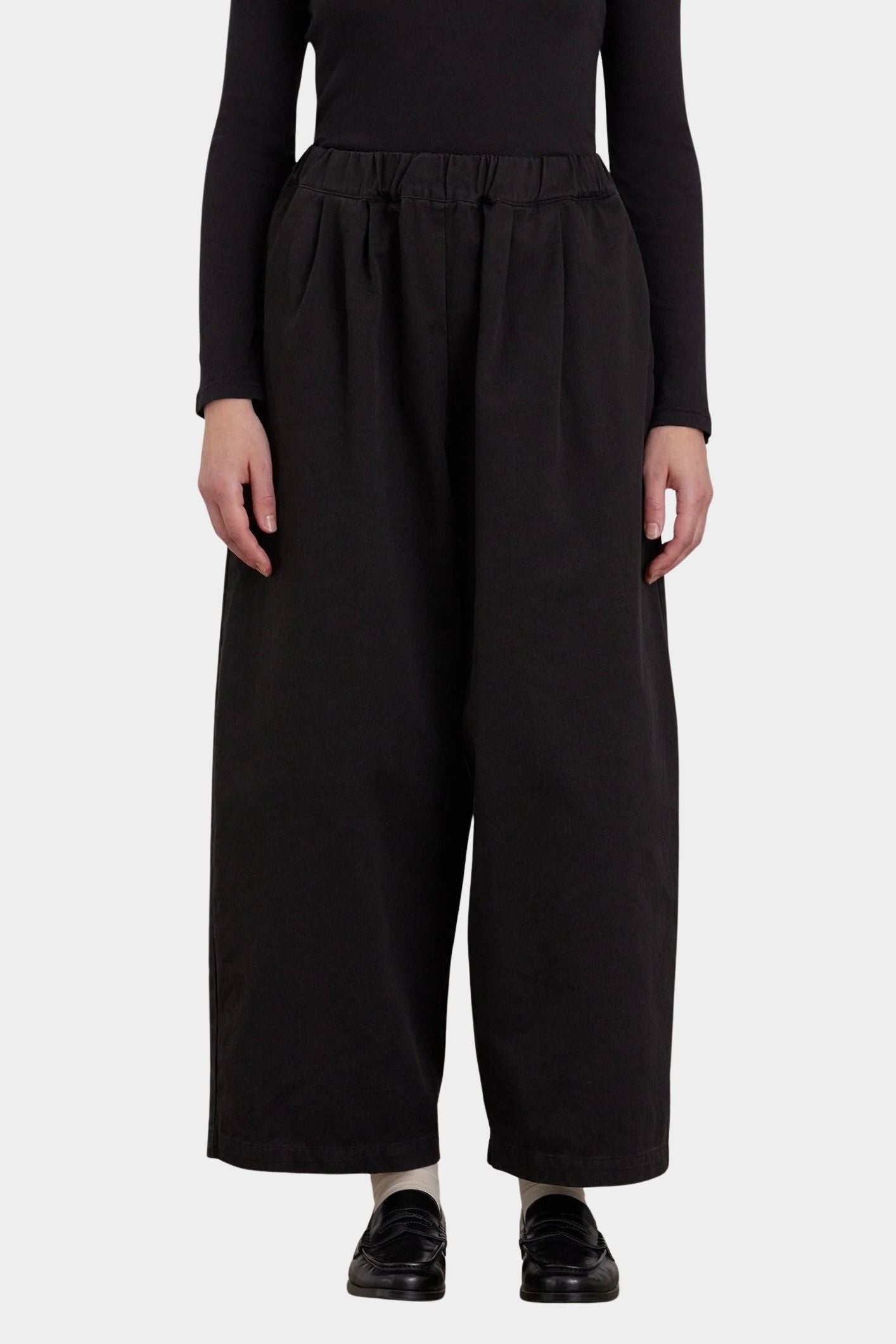Black Crane Wide Pants Black front detail with elastic waist and softly pleated wide leg