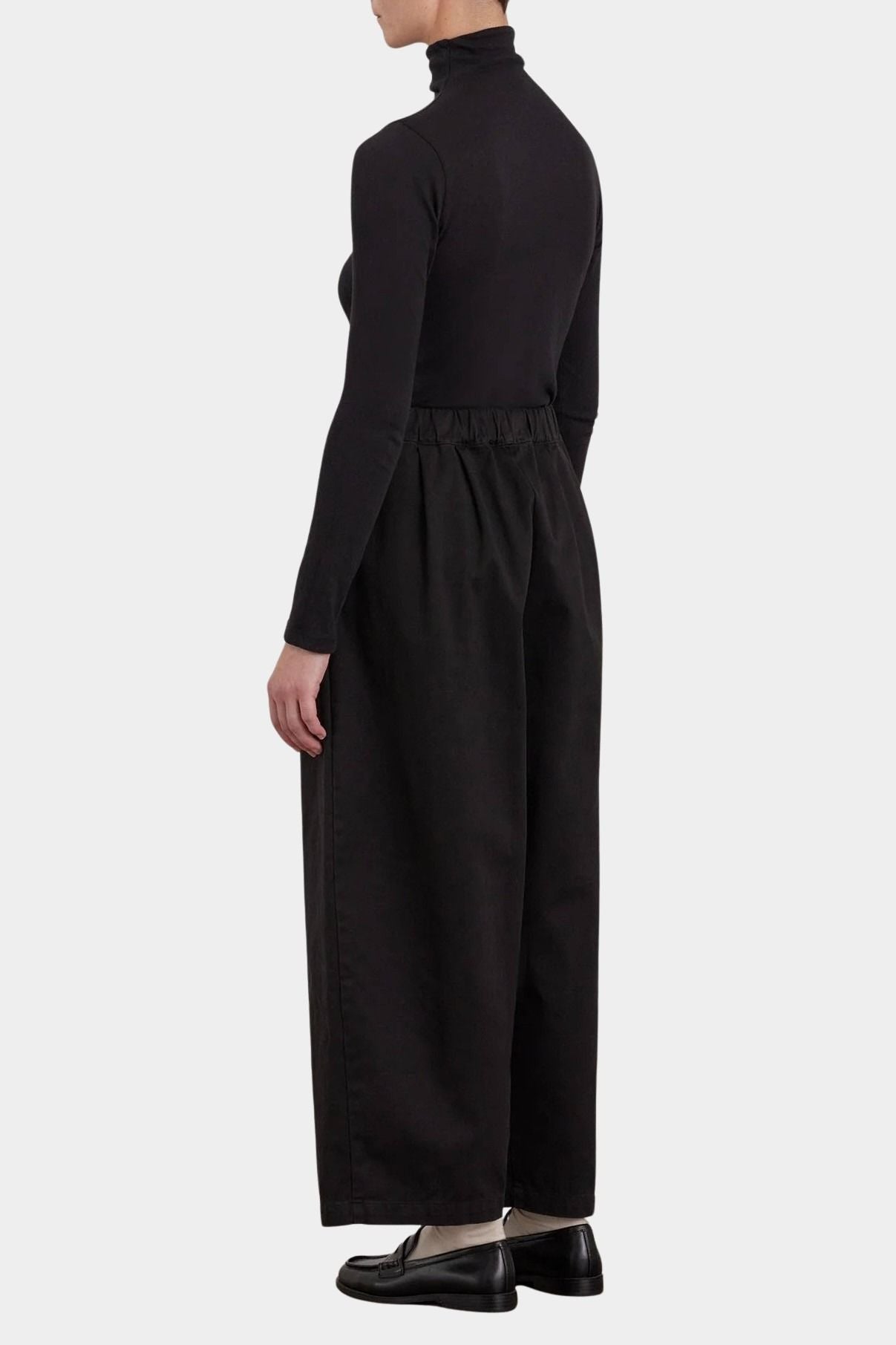 Black Crane Wide Pants Black back view with elastic waist and cropped wide leg
