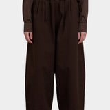 Black Crane Wide Pants Dk. Cacao front view with elastic waistband and softly pleated wide leg