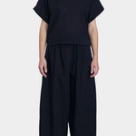 Black Crane wide pants midnight side profile cropped length relaxed structure