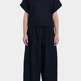 Black Crane wide pants midnight side profile cropped length relaxed structure