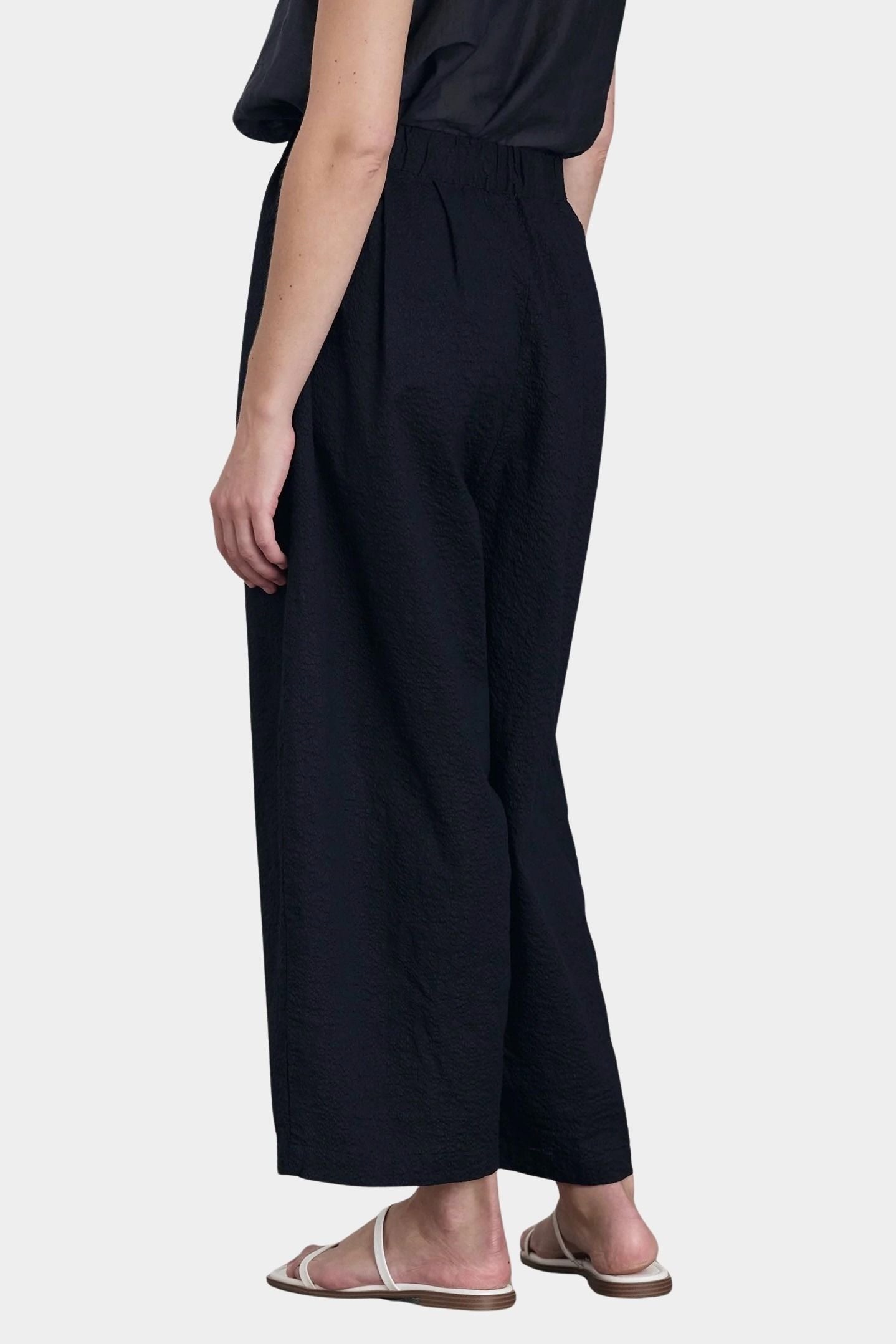 Black Crane wide pants midnight angled view elastic waistband volume shape