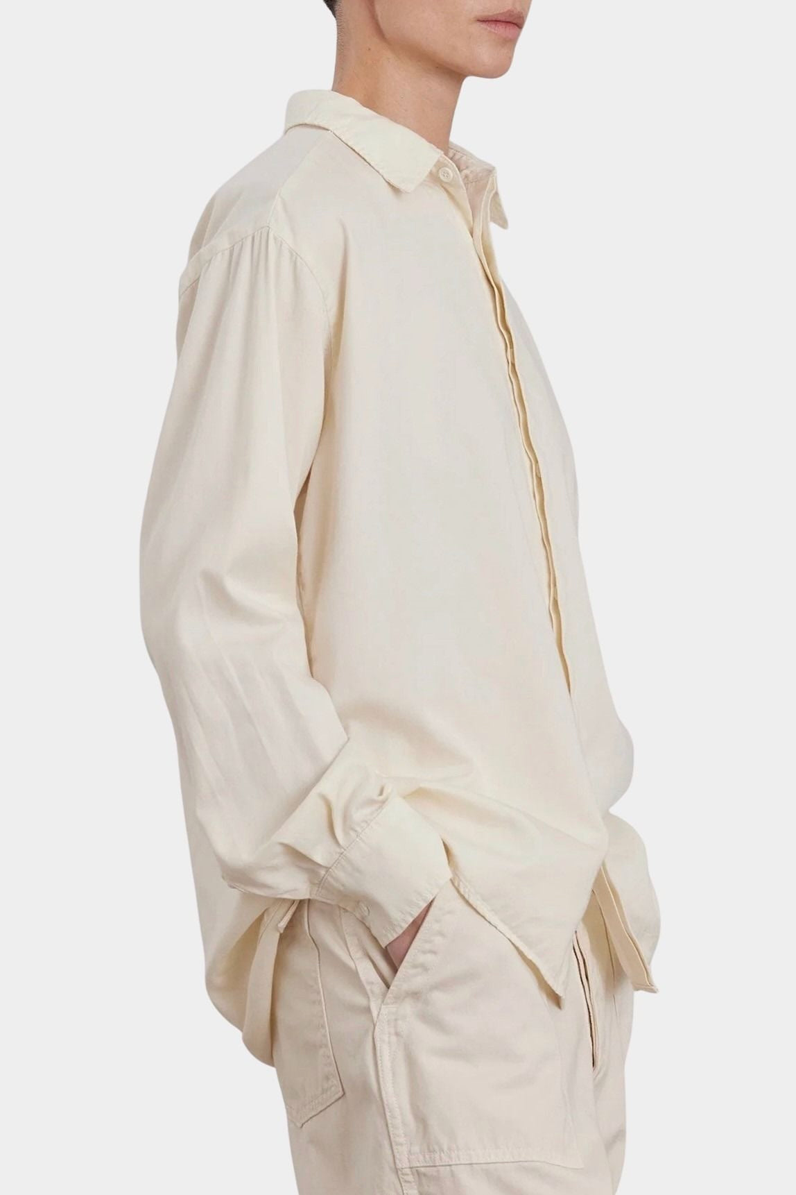 Black Crane Work Shirt Natural side detail showing soft drape, long sleeves and button cuffs