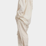 Black Crane Work Shirt Natural full side view showing oversized silhouette and curved shirttail hem
