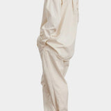 Black Crane Work Shirt Natural full side view showing oversized silhouette and curved shirttail hem