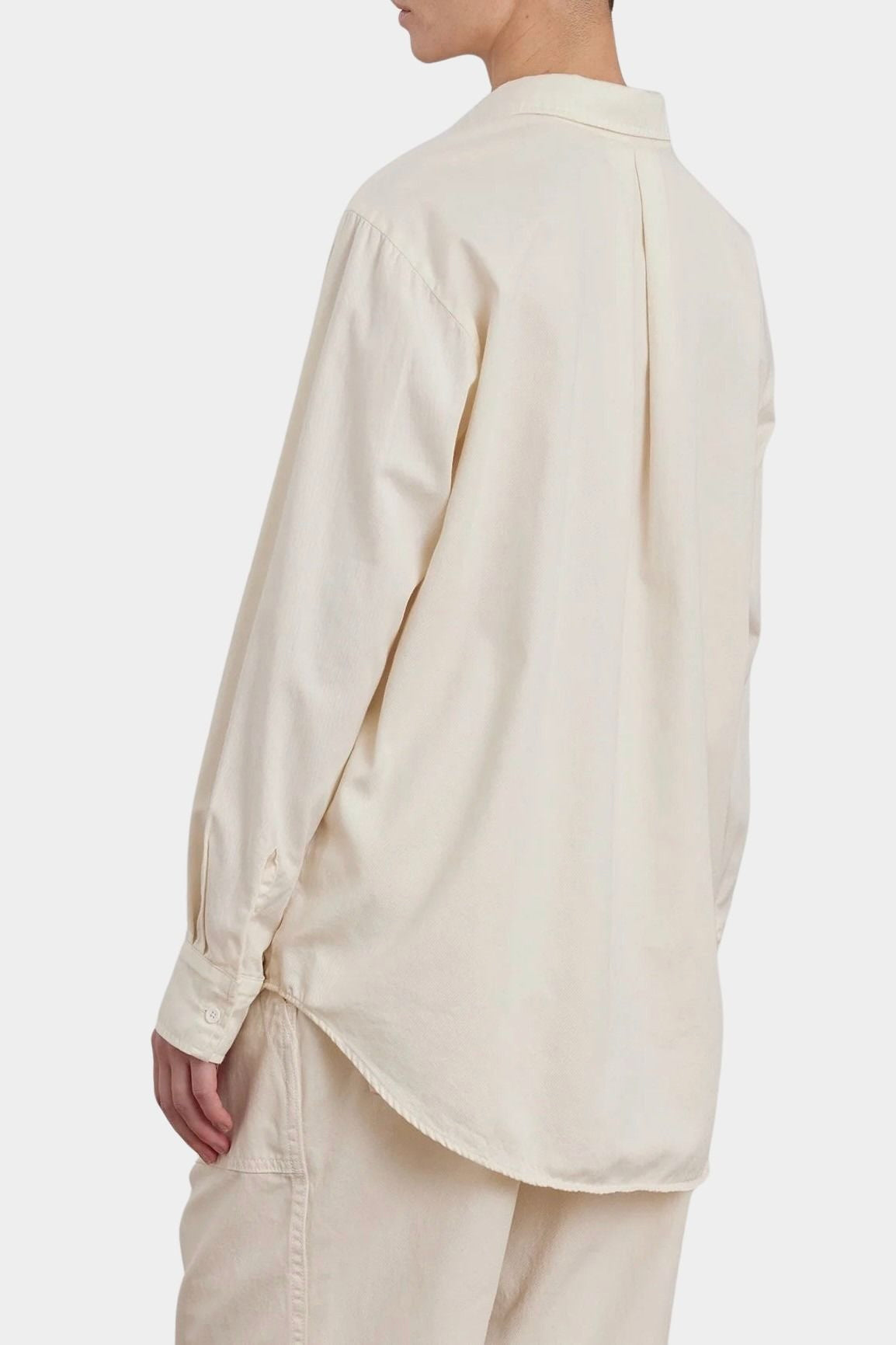 Black Crane Work Shirt Natural back view showing center pleat, dropped shoulders and curved hem