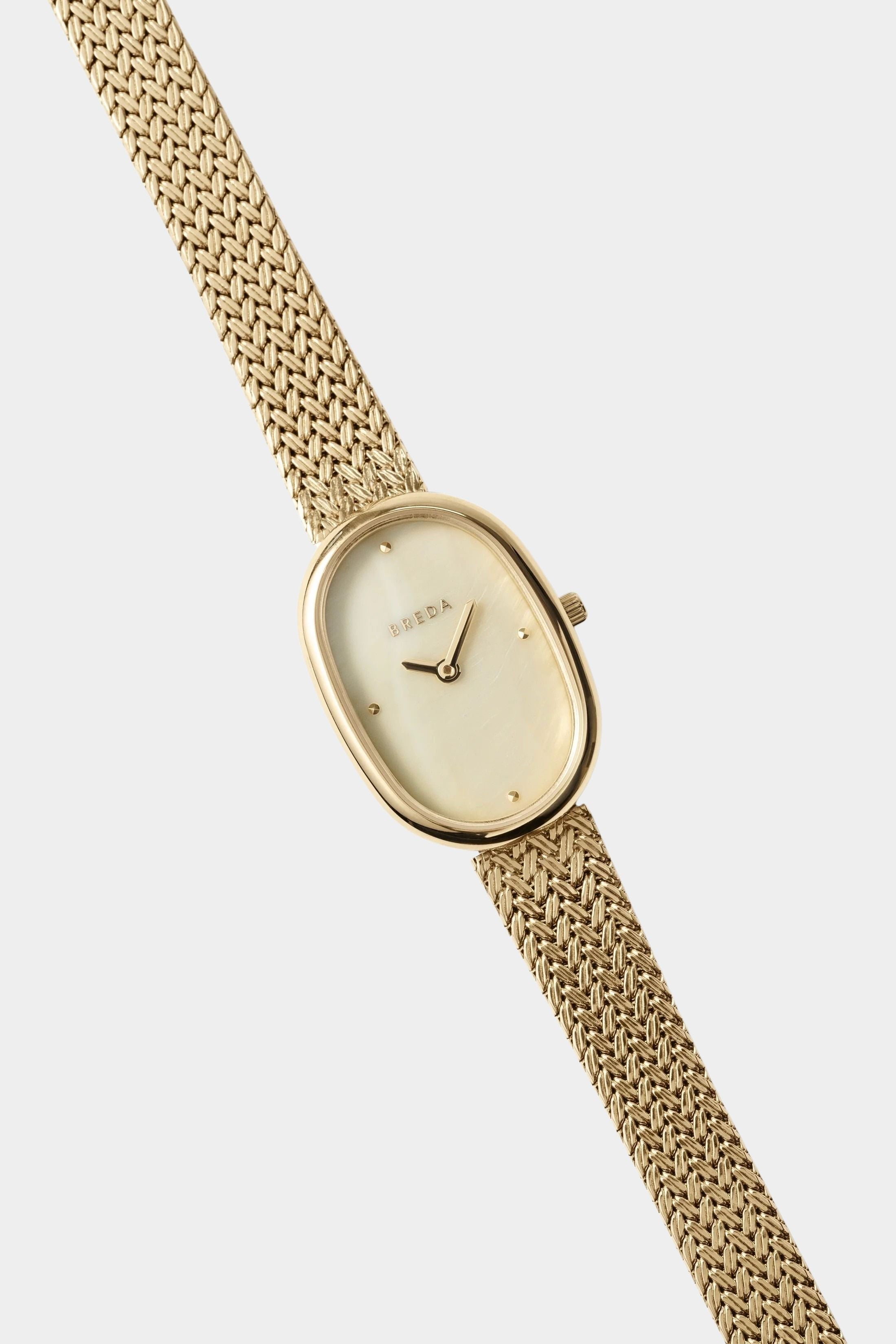 BREDA Jane Tethered 23mm gold watch with champagne mother of pearl dial and woven bracelet at YUCCA Denver