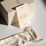 BREDA watch packaging with branded presentation box, cream storage pouch and printed card