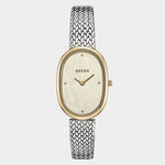.
Front view of BREDA Jane Tethered watch with champagne mother of pearl dial and two tone metal desig
