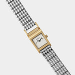 BREDA Revel gold and silver watch with petite square dial and polished stainless steel bracelet at YUCCA Denver