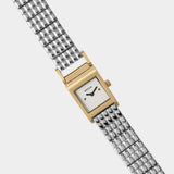 BREDA Revel gold and silver watch with petite square dial and polished stainless steel bracelet at YUCCA Denver