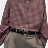 Cordera Classic Belt Black styled with checked oversized shirt at YUCCA Denver