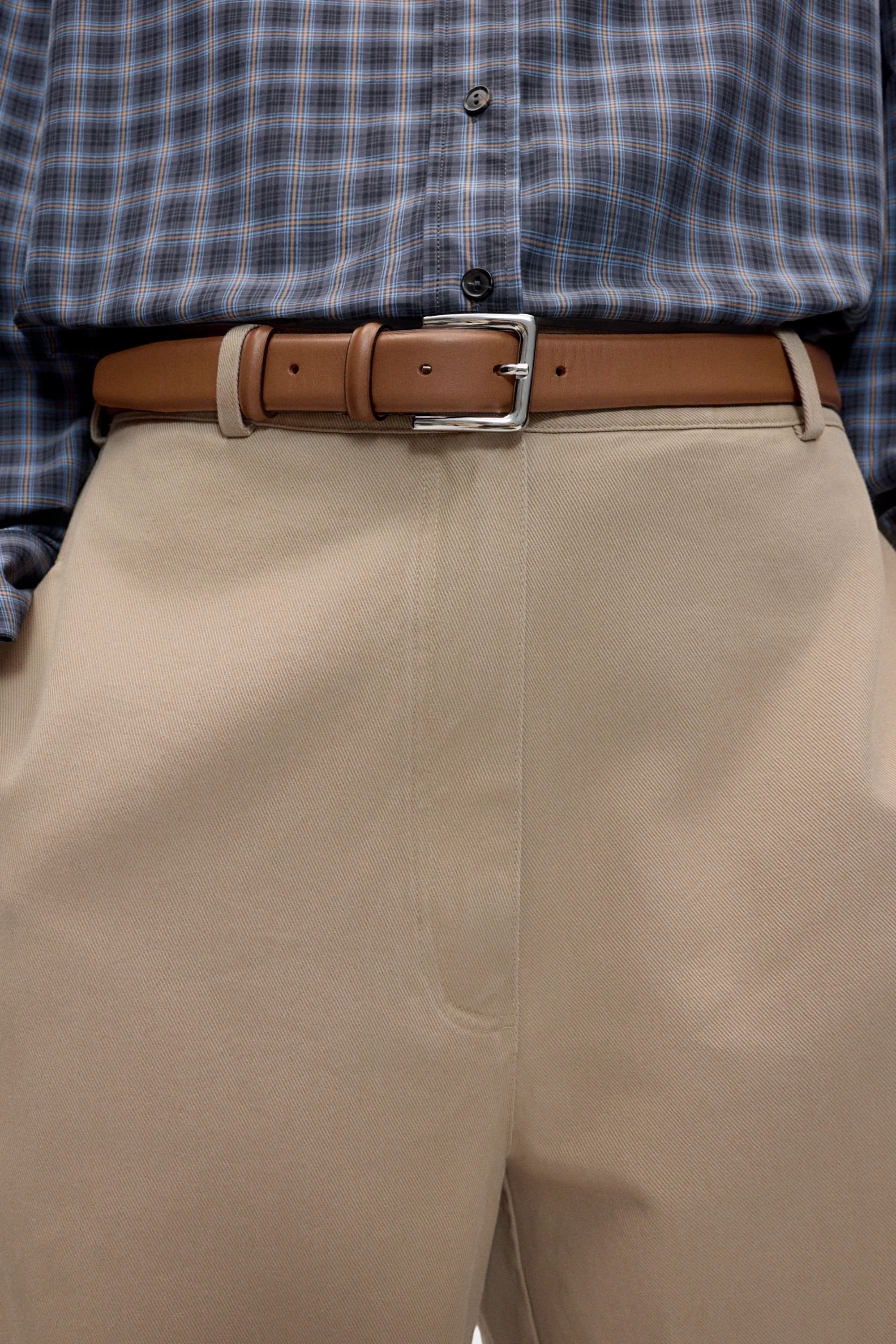 Cordera Classic Belt Tan styled with checked bomber shirt at YUCCA Denver