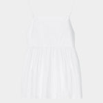 White cotton camisole top with tonal embroidery, thin straps, and gathered waist seam