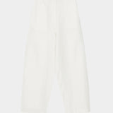 White cotton linen curved leg pants with front closure, belt loops, and softly structured silhouette