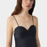 Black camisole dress with heart-shaped neckline, thin straps, and structured bust seam
