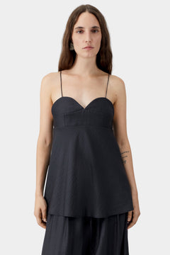 Black heart-shaped neckline camisole with thin straps, structured bust, and soft drape