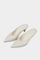 Cordera | Leather Pointy Mules In White - SHOP YUCCA Shoes CORDERA - YUCCA Women’s clothing store Denver, women’s clothing website, women’s elevated basics, women’s high quality shoes, women’s luxury shoes, women’s online footwear 