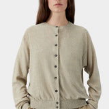 Beige flecked knit cardigan with button front closure and subtle texture