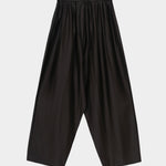 Black maxi pants with elastic waistband, drawstring closure, and wide leg silhouette